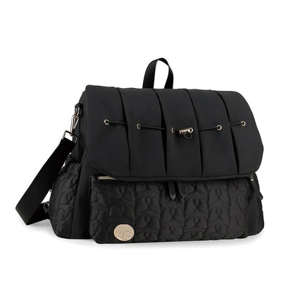 Cloudscape Diaper Backpack with Organized Storage and Convertible Design in black, shown from the front with a quilted pattern on the lower pocket and gold hardware.