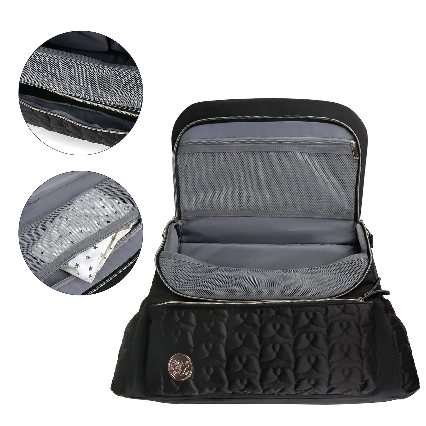 Cloudscape Diaper Backpack with Organized Storage and Convertible Design in black, open to reveal multiple interior compartments and mesh pockets, with close-ups of the organized storage.