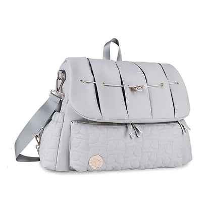 Cloudscape Diaper Backpack with Organized Storage and Convertible Design in gray, shown from the front with a quilted pattern on the lower pocket and gold hardware.