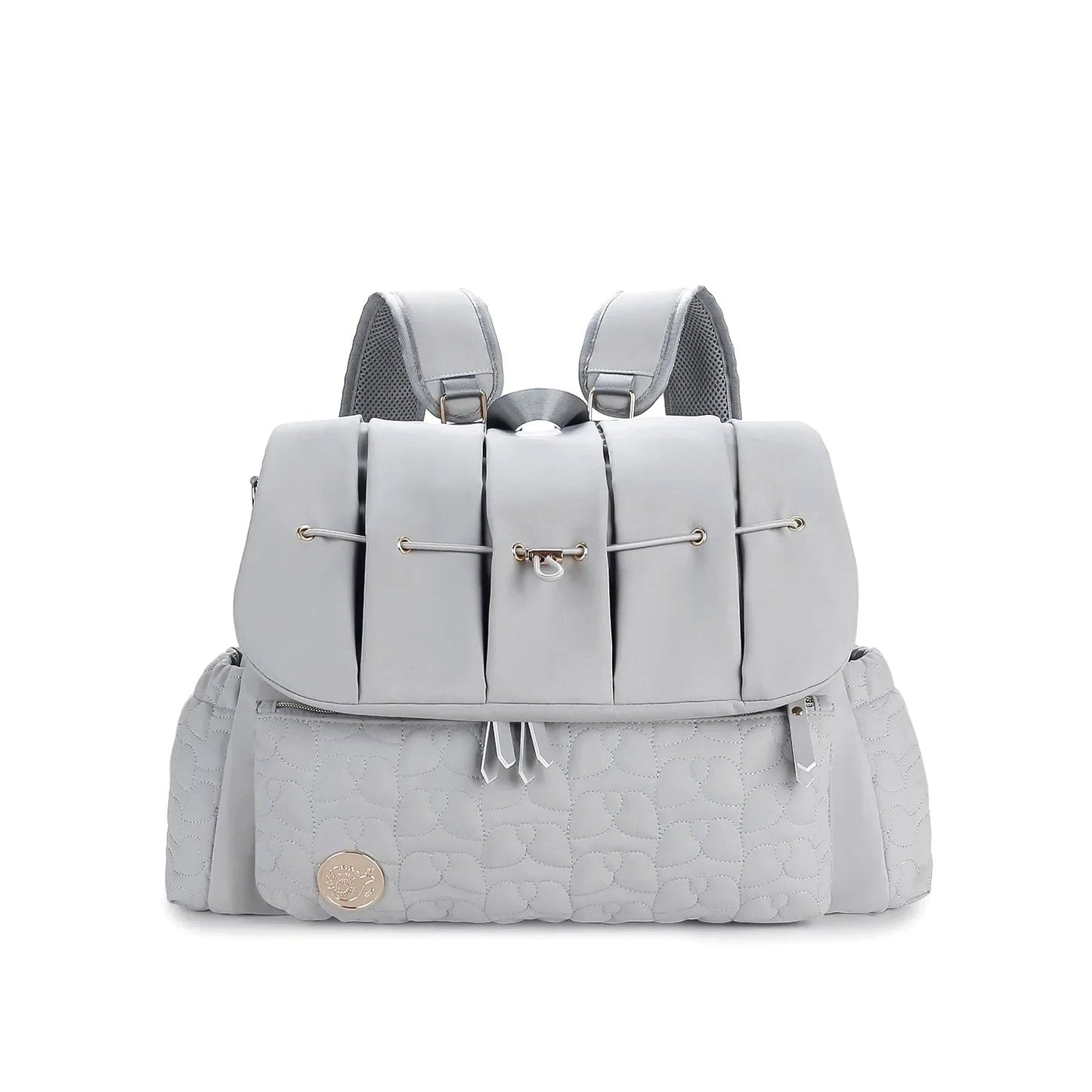 A gray Cloudscape Diaper Backpack with organized storage and convertible design, shown from the front in a closed position, featuring a quilted bottom pocket.