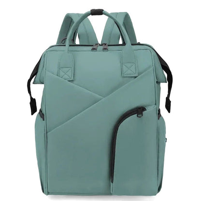 Cloudscape Modern Diaper Backpack in green, front view, displaying its stylish aesthetic, ample storage, and practical features for everyday use.