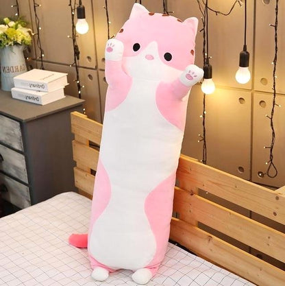 Cuddle Haven Pink Cat Plush Toy, a long soft fabric stuffed animal with a huggable design, standing upright on a bed. Ideal for kids gifts and cozy snuggles. Measures 43 inches (110 cm).