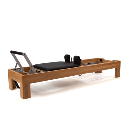 Peak Pilates Artistry Reformer with Leather side view of the frame